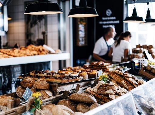 Bread and pastries on a display in a bakery